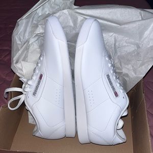 Brand new white Reebok classics. Size 8.5 W